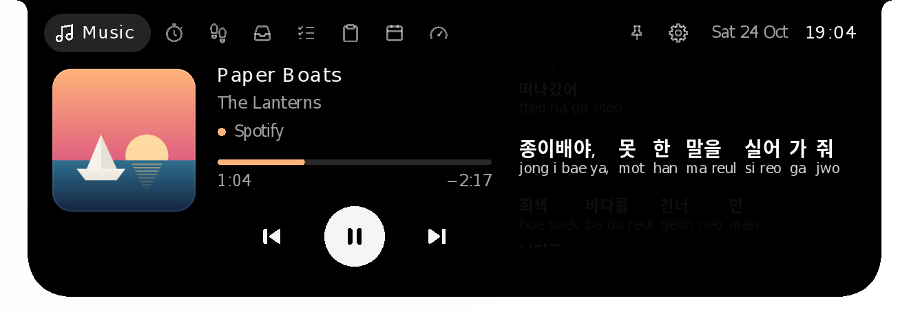 The Music page with Korean lyrics, each word's reading in Latin letters set small underneath
