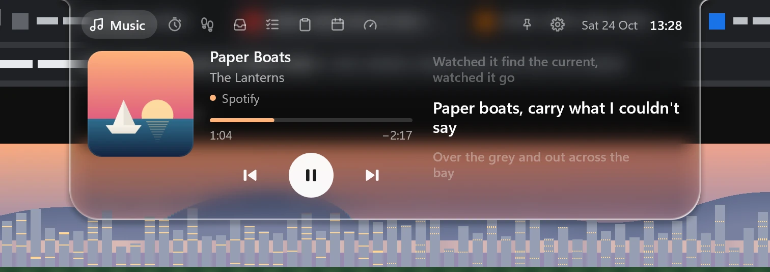 The Music page in the Glass theme over a dark video page, in dark mode